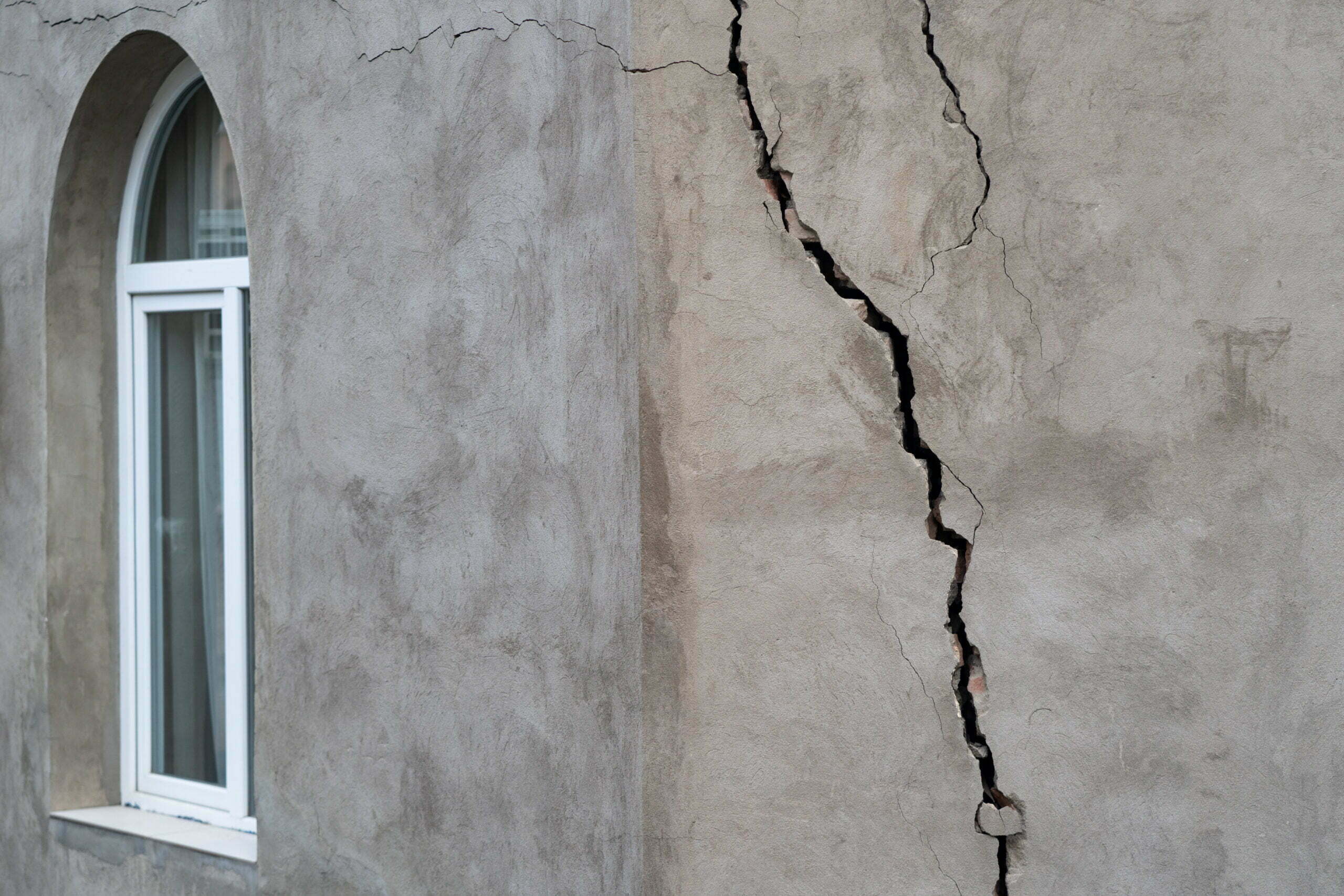 Cracked wall of house destroyed during strong earthquake in Tbilisi Georgia. Damage on buiding.